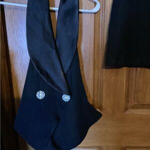 Elegant formal 2 pc. Skirt set with tuxedo top , new with tags size 8.